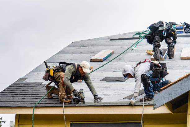 Professional Gutter Installation technician working in Agra, OK